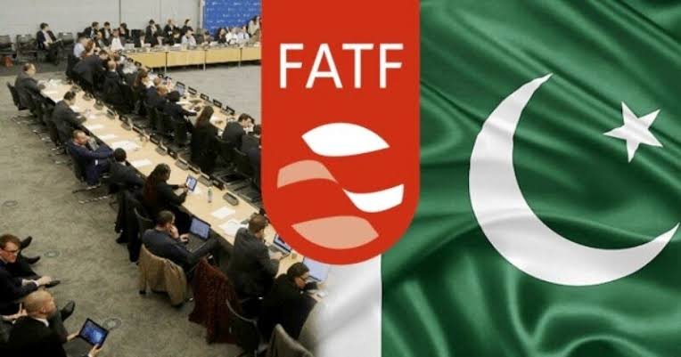 conference happening - fata logo and pakistan flag on the other side