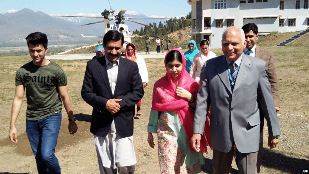 Pakistani activist and Nobel Peace Prize laureate Malala Yousafzai and the principal of all-boys Swat Cadet College Guli Bagh