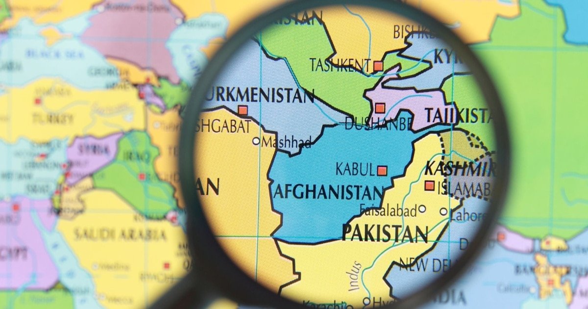 A map of Pakistan and Afghanistan under a magnifying glass