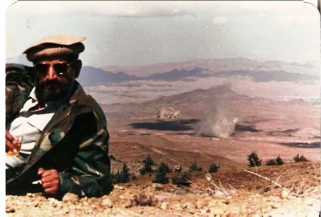 Brigadier Yasub Dogar of ISI enjoying tea while Soviet supply depots are destroyed in the background