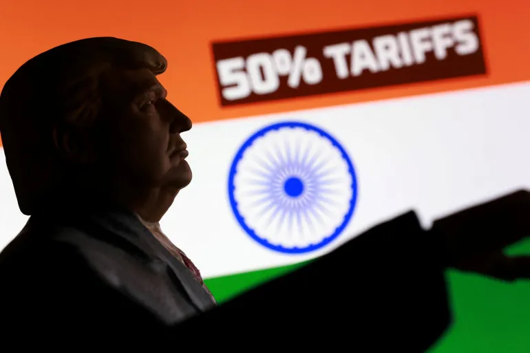An Indian flag, a 3D-printed miniature model depicting President Donald Trump and the phrase ‘50% tariffs’ are seen in this illustration taken August 27, 2025