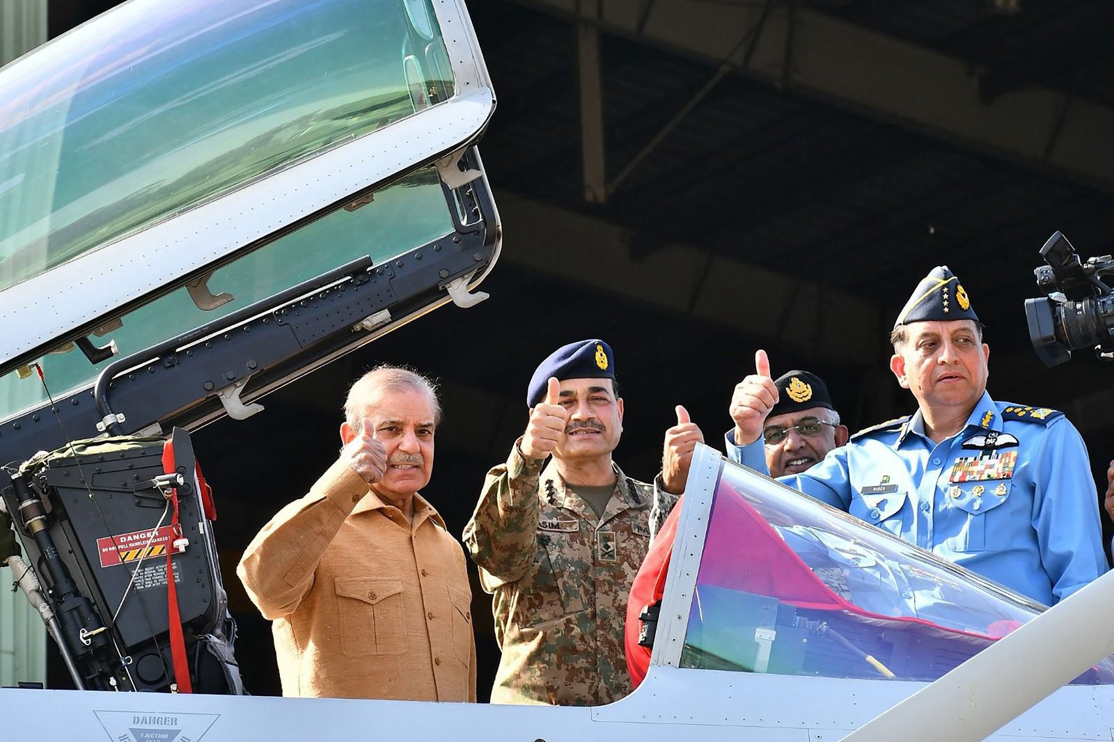 Chiefs of Armed Forces of Pakistan thumbs up with Prime Minister of Pakistan.
