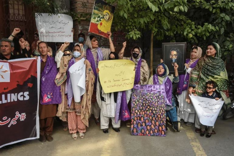 Human rights activists shout slogans during a protest in Quetta on July 26, 2025, against the alleged honour killing of a couple last month in Balochistan.