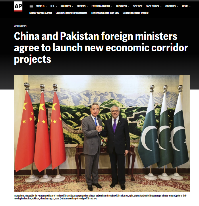 In this photo, released by the Pakistan’s Ministry of Foreign Affairs, Pakistan’s Deputy Prime Minister and Minister of Foreign Affairs Ishaq Dar, right, shakes hand with Chinese Foreign Minister Wang Yi, prior to their meeting in Islamabad, Pakistan, Thursday, Aug. 21, 2025. (Pakistan’s Ministry of Foreign Affairs via AP)