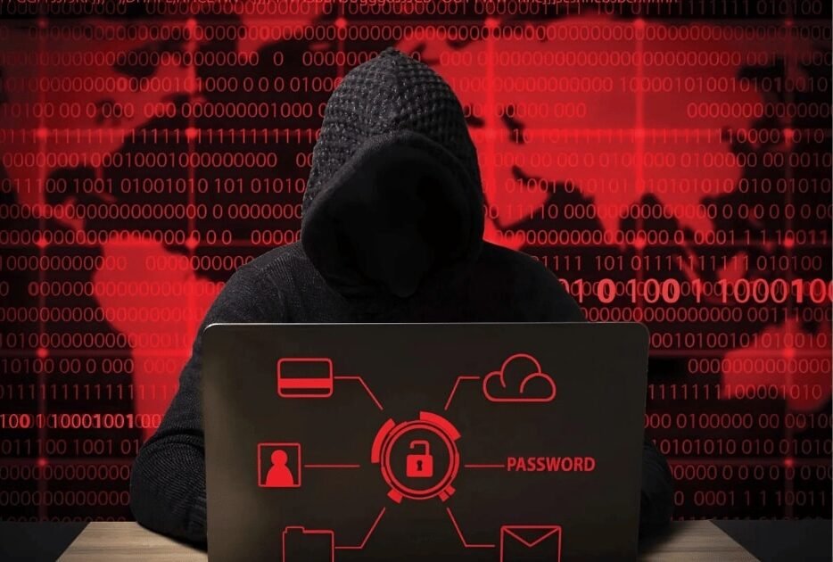 An anonymous Hacker with laptop