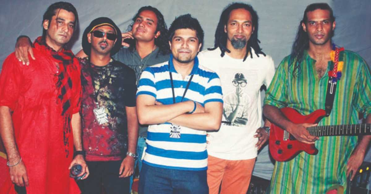 The image showcases an old picture of the band. 
