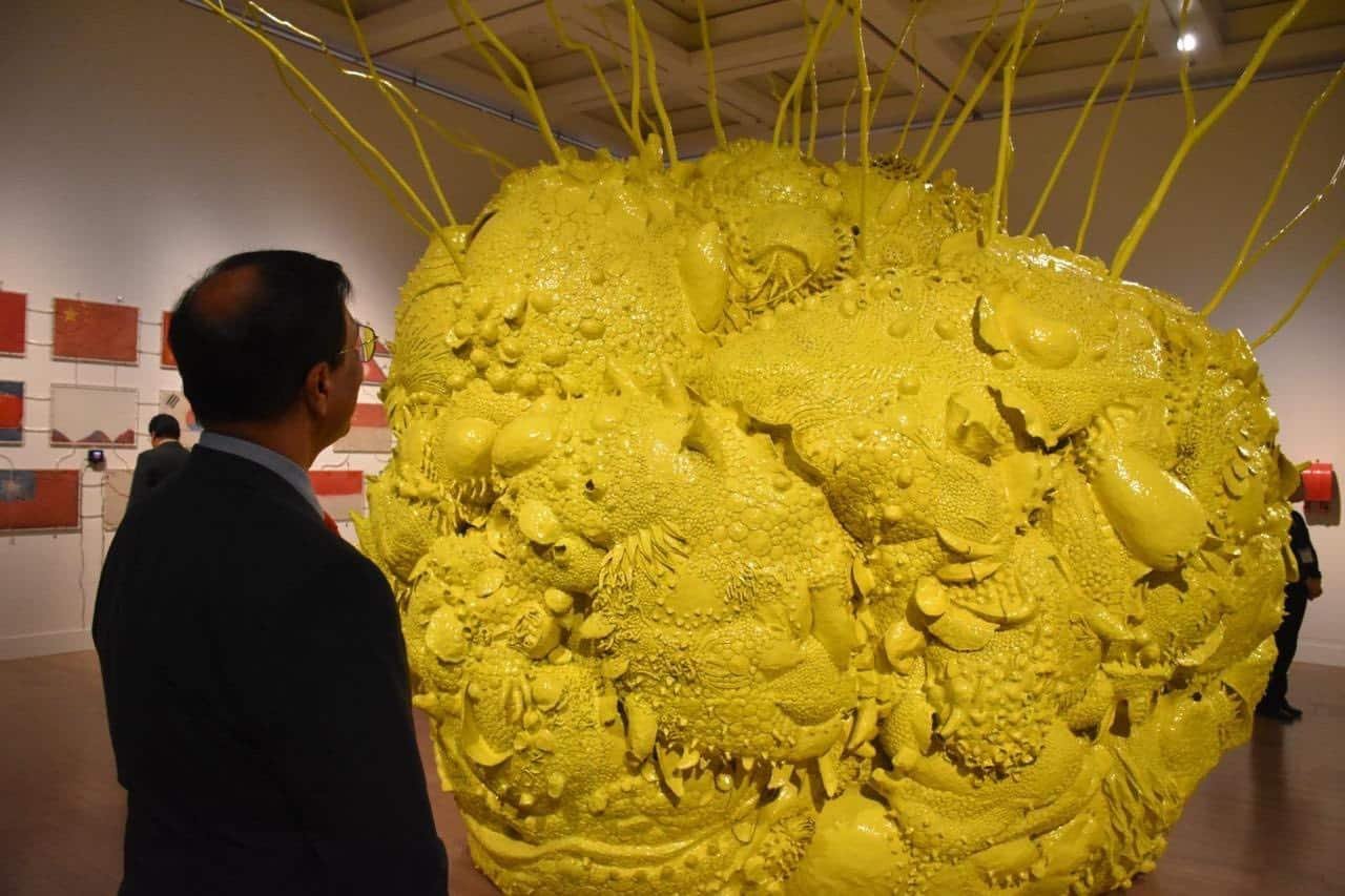 Cultural Diplomacy: Pakistan and Japan Deepen Artistic Exchange 1 The image shows Ambassador Abdul Hameed standing in front of a painting at NACT.