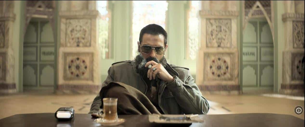 The image showcases a still from the film Dhurandhar.