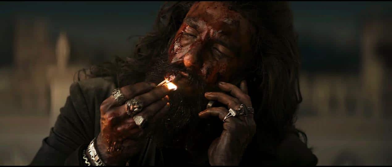 The image showcases the still of a scene from the film Dhurandhar.