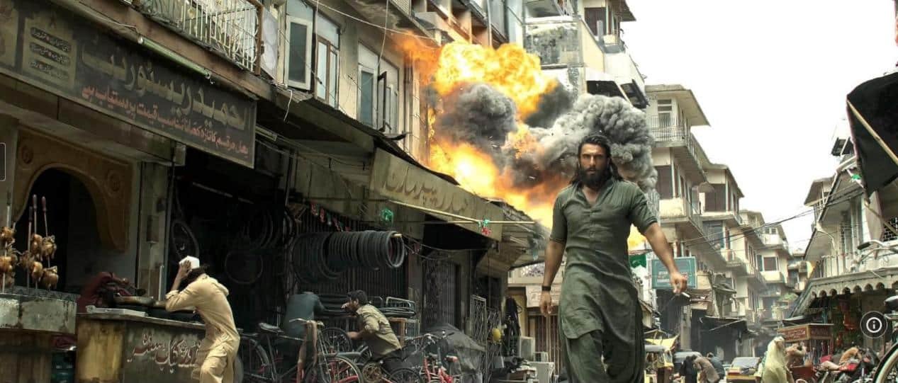 The image showcases a still from the film Dhurandhar.