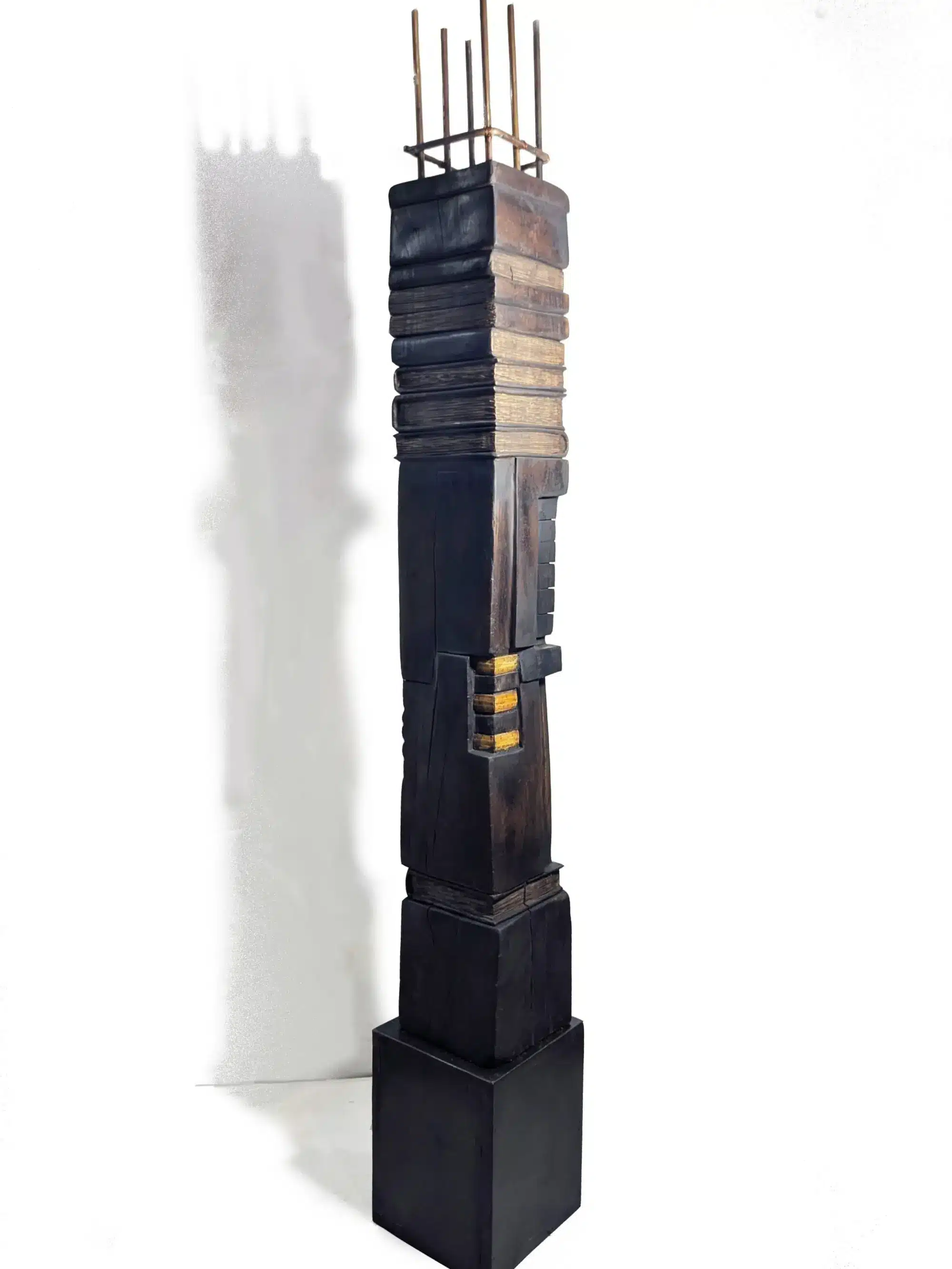 The image showcases a sculpture by Syed. The Metal Whisperer: Munawer Ali Syed Scrapes the Soul of the City